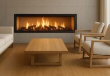 Are Inbuilt Wood Fireplaces Environmentally Friendly? Modern inbuilt wood fireplace with a sealed firebox and matched flue kit, bright clean flames visible through clear glass.