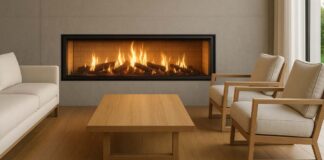 Are Inbuilt Wood Fireplaces Environmentally Friendly? Modern inbuilt wood fireplace with a sealed firebox and matched flue kit, bright clean flames visible through clear glass.
