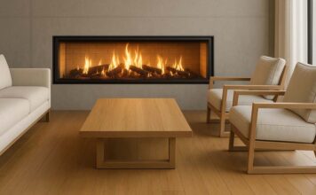 Are Inbuilt Wood Fireplaces Environmentally Friendly? Modern inbuilt wood fireplace with a sealed firebox and matched flue kit, bright clean flames visible through clear glass.