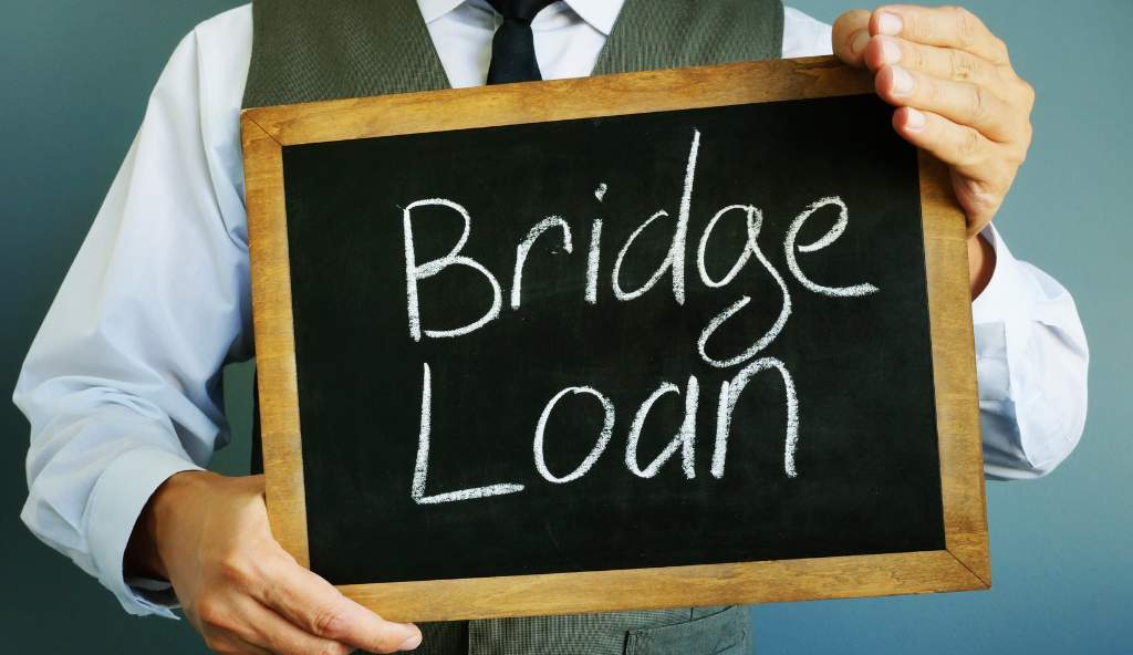 Real estate investor securing a bridging finance loan for property purchase