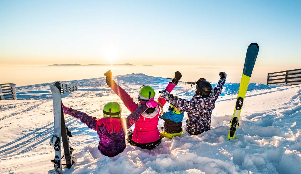 Family enjoying quality time together in the snow